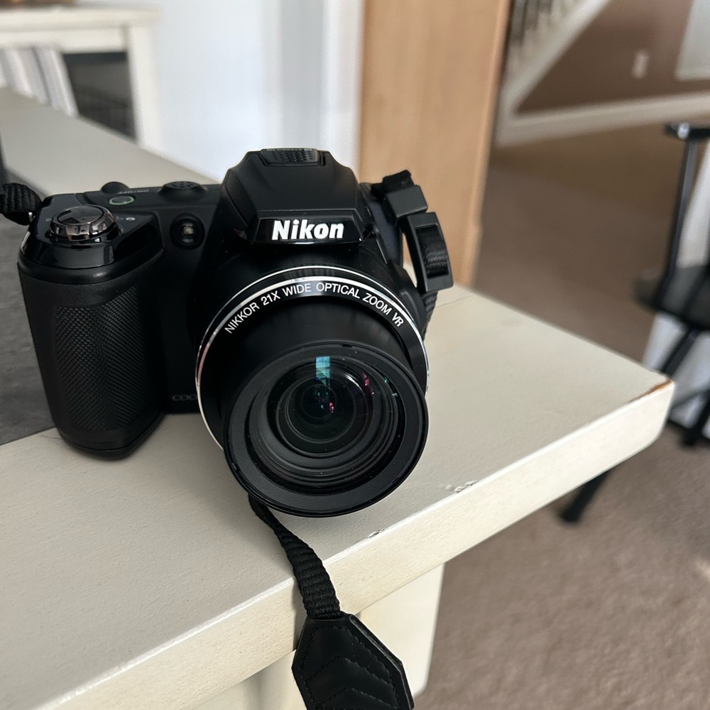 Nikon Coolpix L120 digital camera with carry case